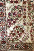 A GOOD LARGE HAND EMBROIDERED COTTON TEXTILE, 20th Century, Susani, 9ft 2ins x 6ft 8ins.
