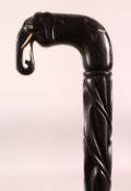 A GOOD CEYLONESE CARVED EBONY ELEPHANT HANDLE WALKING STICK - carved handle in the form of an