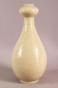 A CHINESE SONG / DING STYLE CARVED PORCELAIN VASE, with scraffito decoration, 34cm