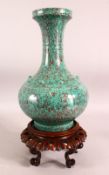 A CHINESE ROBINS EGG GLAZED PORCELAIN VASE & STAND - the body with a robins egg glaze, with raised