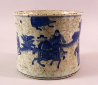 A CHINESE BLUE & WHITE CRACKLE GLAZED PORCELAIN BRUSH POT- decorated with figures upon horseback -