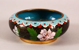 A 19TH / 20TH CENTURY CHINESE CLOISONNE BRUSH WASHER - decorated upon a black ground with native