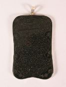 A RARE AND FINE INDO PERSIAN LARGE ENGRAVED SPINACH JADE PENDANT with silver mounts, engraved with