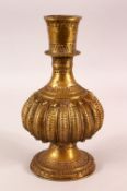 A 18TH / 19TH CENTURY INDIAN BRASS HUQQA BASE - with a ribbed central body - 24cm