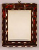 A TURKISH OTTOMAN EBONY TORTOISESHELL AND BONE INLAID MIRROR, 30cm x 23.5cm.