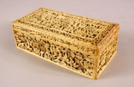 A FINELY CARVED CANTON IVORY CASKET, with well carved panels of scenes depicting figures in