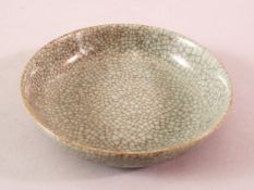 A CHINESE SONG STYLE RU WARE CELADON DISH - with a crackle glaze 14cm