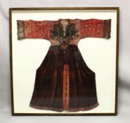 A 19TH CENTURY OR EARLIER UZBEK OR TIBETAN DRESS, with embroidered and mirrored sleeves and plum