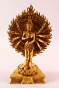 A CHINESE BRASS MULTI ARM GODDESS / DEITY GUANYIN - Stood upon a pedestal style base with multi arms
