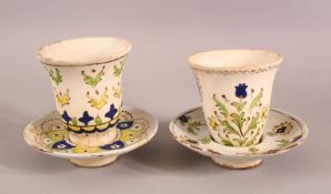 TWO TURKISH CUPS & SAUCERS - with floral motif decoration (4)