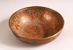 A SMALL ENGRAVED COPPER QAJAR BOWL, 10cm diameter.