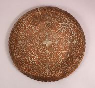 A FINE DAMASCUS SILVER INLAID COPPER DISH - With stylized calligraphy and motif decoration - 30cm