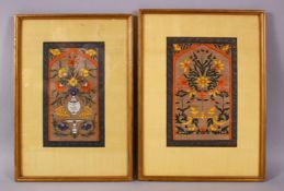 A PAIR OF INDIAN MINIATURE FRAMED PAINTINGS, each decorated with displays of native flora, one