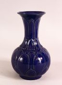 A CHINESE BLUE GLAZED PORCELAIN MOULDED VASE - 17.5cm high.