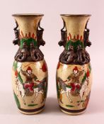 A PAIR OF CHINESE MING STYLE FAMILLE ROSE CRACKLE GLAZED CARNIVAL VASES - each decorated with