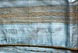 A SYRIAN ABBA SLEEVELESS GOWN, turquoise ground with gilt decoration (af), approx. 4ft 6in long.