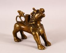 A RARE 16TH/17TH CENTURY TIBETAN OR NEPALESE BRONZE STANDING LION, possibly an incense holder,
