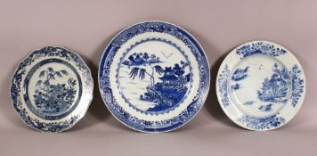 THREE 18TH / 19TH CENTURY BLUE & WHITE PORCELAIN PLATES - each with landscape views - two AF -