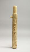 A JAPANESE CARVED BONE TUBE