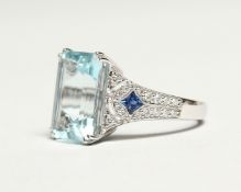 AN 18CT. WHITE GOLD AND AQUAMARINE RING, the rectangular aquamarine approx. 6.3ct, the shoulders set