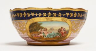 A VIENNA CIRCULAR BOWL, blue and gilt border painted with two ovals. Mark in blue 6ins diameter.