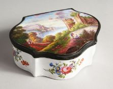 A 19TH CENTURY CONTINENTAL SHAPED ENAMEL BOX AND COVER, painted with a lake and ruins. 5.5ins long.