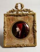 A SUPERB LIMOGES ENAMEL CIRCULAR PLAQUE Signed HENNER 3ins diameter, in a good ornate frame, 7ins