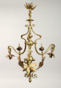 IN THE MANNER OF W. N.S. BENSON, A BRASS AND SOPPER ART NOUVEAU STYLE THREE LIGHT CHANDELIER.
