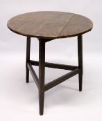 AN 18TH CENTURY STYLE CRICKET TABLE , the circular top supported on three square legs united by
