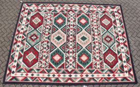 A LARGE KELIM CARPET 11ft 4ins long x 9ft wide.