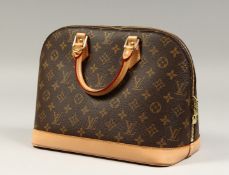 A LOUIS VUITTON LEATHER BAG, as new with dust cover.