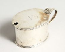 AN OVAL SILVER MUSTARD POT with sapphire blue liner. London 1898