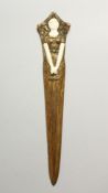 ALFRED JOREL, A GILT BRONZE AND IVORY ART NOUVEAU PAPER KNIFE, in the form of a female figure,