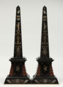 A VERY GOOD PAIR OF EGYPTIAN MARBLE OBELISK with Egyptian figures and hieroglyphs. 20ins high.