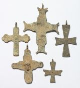 FIVE MEDIUM METAL ROMAN CROSSES. 3ins long