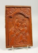 A GREEK CARVED WOOD ICON OF THE MADONNA AND INFANT JESUS. 9ins x 6ins