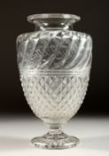 A HOBNAIL CUT FLOWER VASE. 9.5ins high.