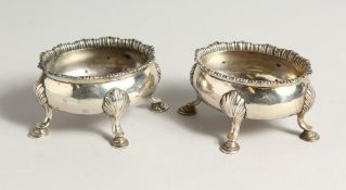 A PAIR OF GEORGE III OVAL SALTS on pad feet. London 1763