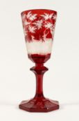 A SUPERB LARGE BOHEMIAN GLASS GOBLET of octagonal shape, etched with deer in a landscape, on an