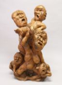 A LARGE UNUSUAL CHINESE ROOTWOOD SCULPTURE OF A MOTHER, FATHER AND THREE CHILDREN, all with
