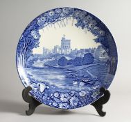 WOOD AND SONS, WINDSOR. A BLUE AND WHITE CHARGER decorated with a scene of Windsor Castle from the