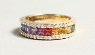 AN 18CT. YELLOW GOLD AND MULTI-COLOURED NATURAL SAPPHIRE RING. Size P