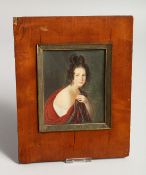 A 19TH CENTURY PORTRAIT MINIATURE OF A YOUNG LADY 4.5ins x 3.5ins in a wooden frame