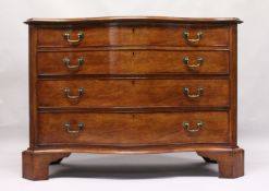 A GEORGE III DESIGN SERPENTINE FRONTED MAHOGANY COMMODE with four graduated long drawers, fluted