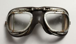 A PAIR OF WW II FLYING GOGGLES.
