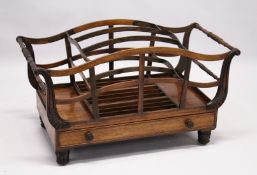 A VERY GOOD GILLOWS OF LANCASTER ROSEWOOD CANTERBURY with curving supports, the centre section