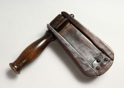 A TREEN BIRD SCARER, dated 1874