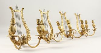 A VERY GOOD SET OF FOUR FRENCH ORMOLU, LYRE, TWO LIGHT WALL SCONCES with acanthus and anthemis.