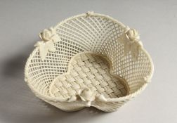 A BELLEEK PORCELAIN TREFOIL SHAPED PIERCED BASKET 5.25ins wide