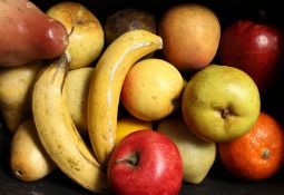 SEVENTEEN PIECES OF REALISTIC MOULDED AND PAINTED FRUIT, some wax.